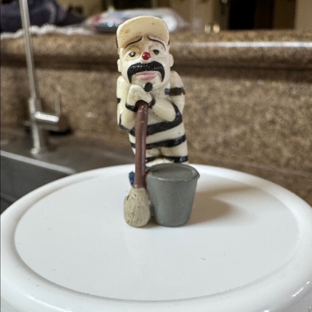 This is a Striper Homies Clown figurine. It is part of the Homies collectible